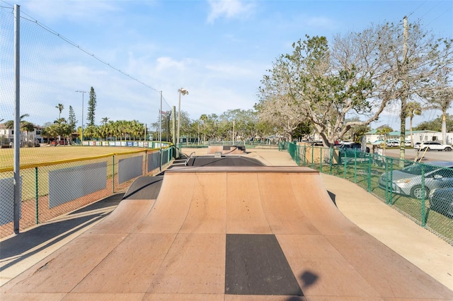 view of property's community featuring fence