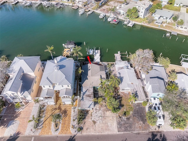 aerial view with a residential view and a water view