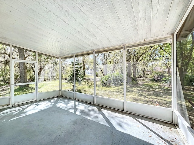 unfurnished sunroom featuring a wealth of natural light