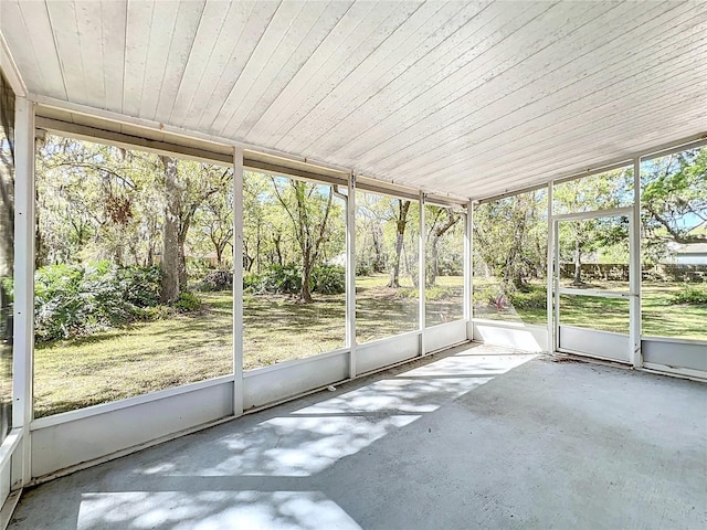 unfurnished sunroom featuring plenty of natural light