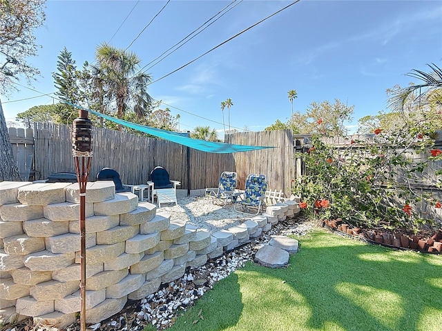 exterior space with a fenced backyard