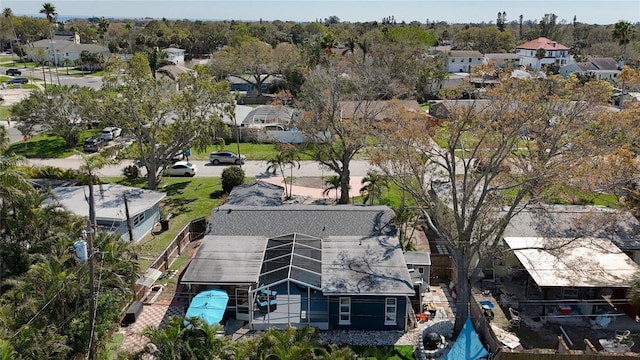 birds eye view of property with a residential view