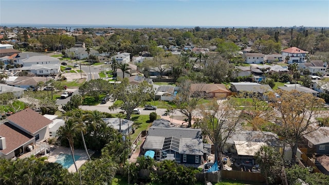 birds eye view of property with a residential view