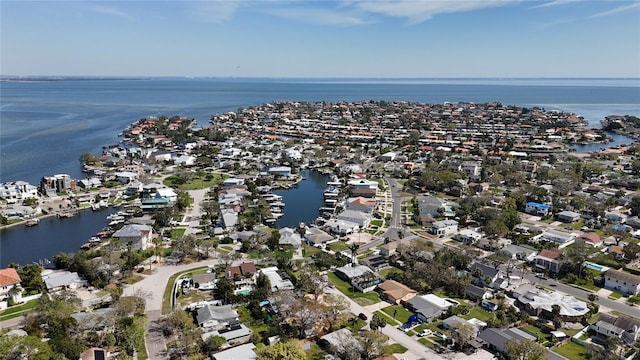 bird's eye view with a residential view and a water view