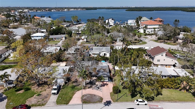 bird's eye view with a water view and a residential view