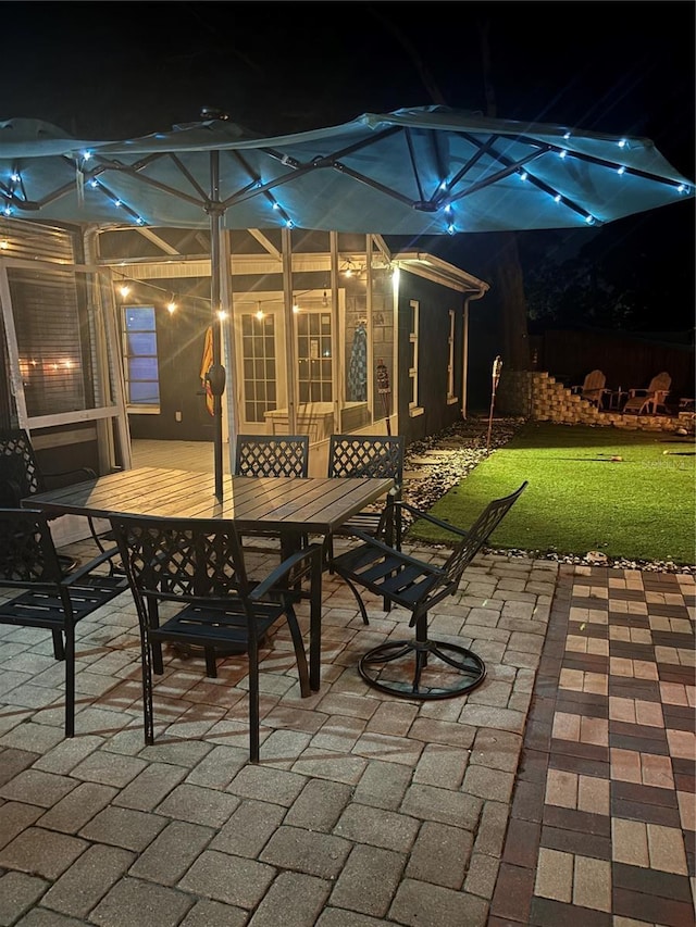 1859 Oklahoma Ave NE, Saint Petersburg, FL 33703 - patio at twilight with outdoor dining area