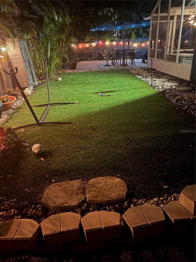 1859 Oklahoma Ave NE, Saint Petersburg, FL 33703 - view of yard with a patio area and a sunroom
