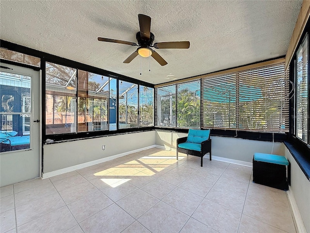 1859 Oklahoma Ave NE, Saint Petersburg, FL 33703 - unfurnished sunroom featuring ceiling fan