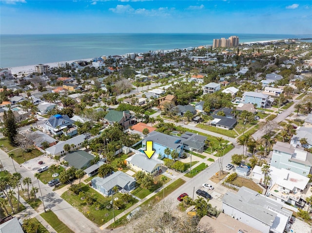 bird's eye view featuring a water view and a residential view