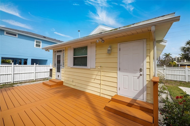 deck featuring entry steps and fence