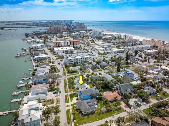 birds eye view of property featuring a view of city and a water view