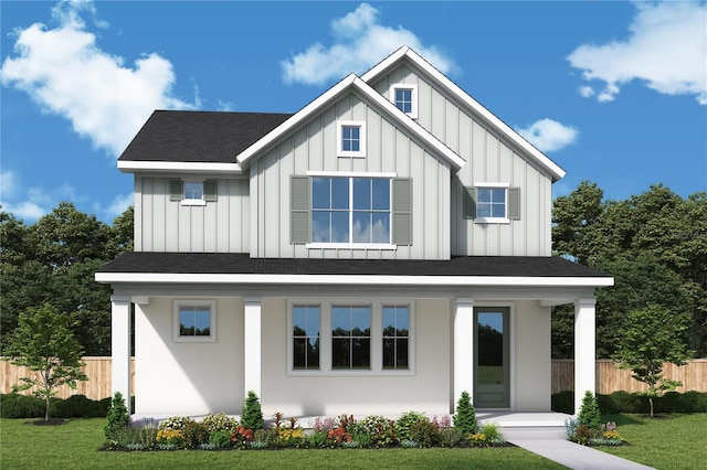 modern farmhouse style home with a shingled roof, board and batten siding, and fence