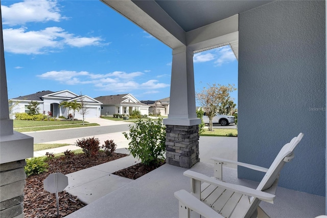 view of patio featuring a residential view