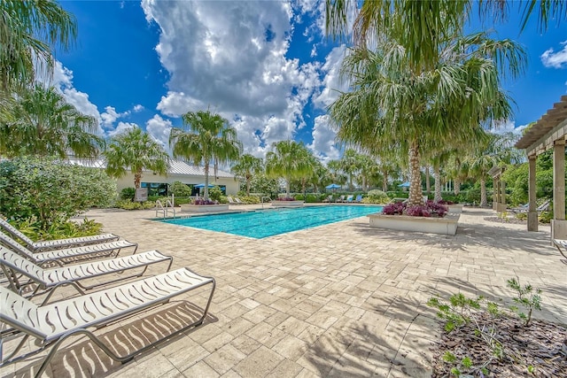 pool with a patio