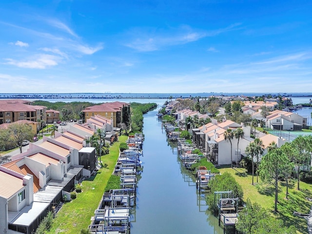 aerial view with a water view and a residential view