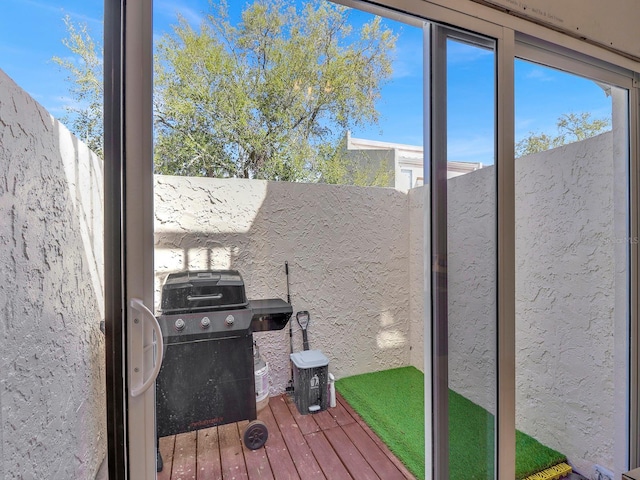 interior space featuring grilling area and a fenced backyard