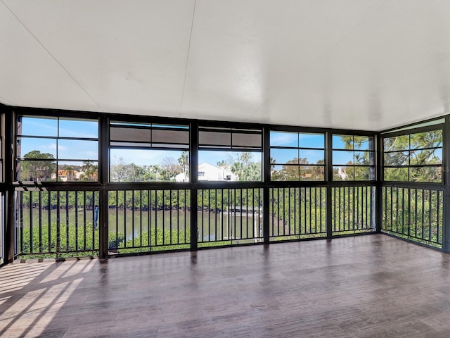 unfurnished sunroom with plenty of natural light