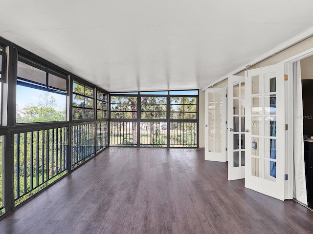 unfurnished sunroom featuring french doors