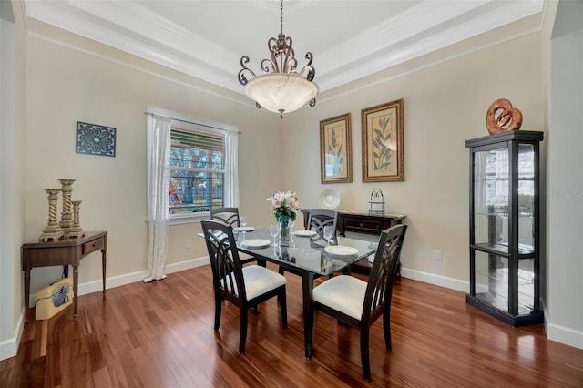 4411 Culbreath Rd, Valrico, FL 33596 - dining area with dark wood-type flooring, baseboards, and ornamental molding