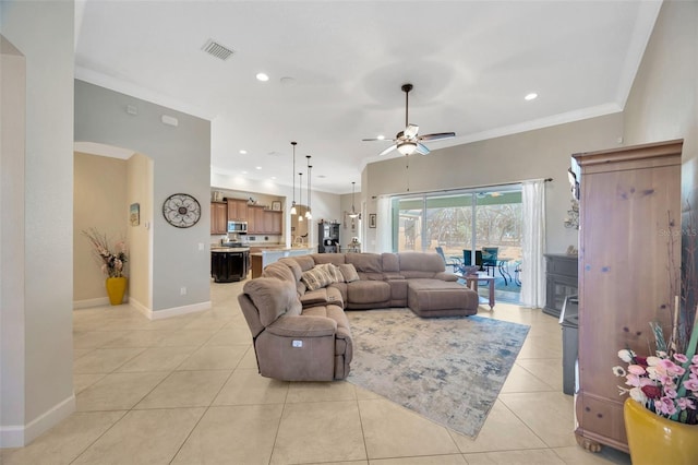 4411 Culbreath Rd, Valrico, FL 33596 - living area with visible vents, baseboards, ornamental molding, recessed lighting, and light tile patterned flooring