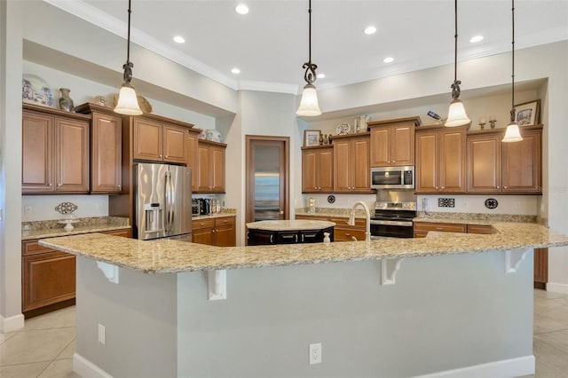 4411 Culbreath Rd, Valrico, FL 33596 - kitchen featuring a large island, appliances with stainless steel finishes, a breakfast bar, and brown cabinetry