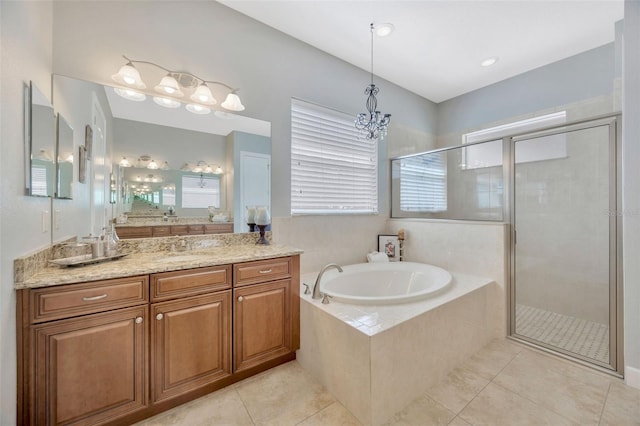 4411 Culbreath Rd, Valrico, FL 33596 - bathroom featuring tile patterned flooring, a stall shower, vanity, and a garden tub