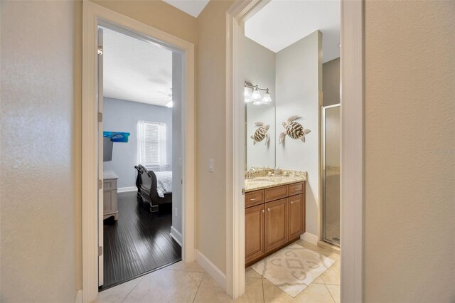 4411 Culbreath Rd, Valrico, FL 33596 - full bathroom with tile patterned flooring, a stall shower, vanity, and ensuite bath