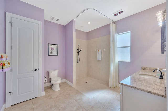 4411 Culbreath Rd, Valrico, FL 33596 - bathroom featuring visible vents, toilet, tile patterned flooring, tiled shower, and vanity