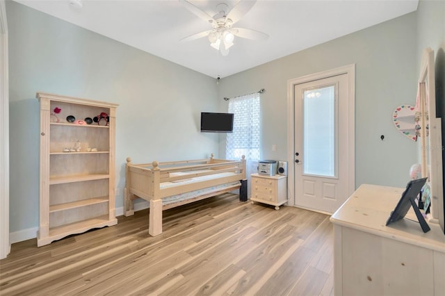 4411 Culbreath Rd, Valrico, FL 33596 - bedroom featuring light wood-style floors and ceiling fan