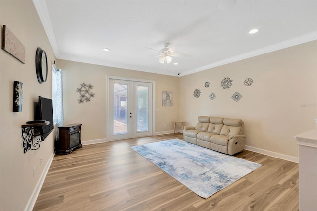 4411 Culbreath Rd, Valrico, FL 33596 - living room with french doors, baseboards, light wood-style floors, and ornamental molding