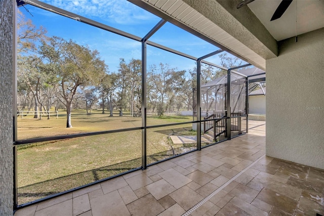 4411 Culbreath Rd, Valrico, FL 33596 - unfurnished sunroom featuring ceiling fan