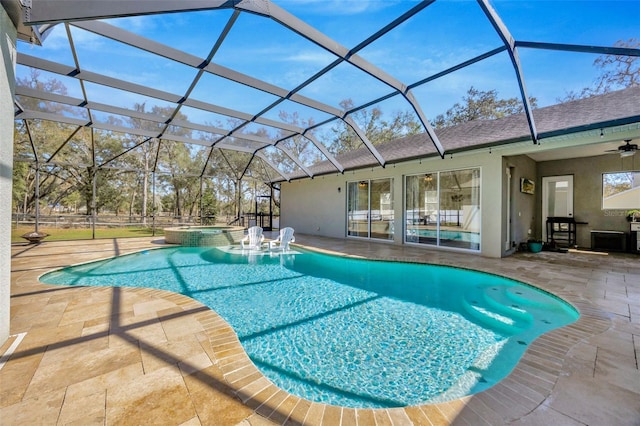 4411 Culbreath Rd, Valrico, FL 33596 - view of swimming pool with glass enclosure, a patio area, and a pool with connected hot tub