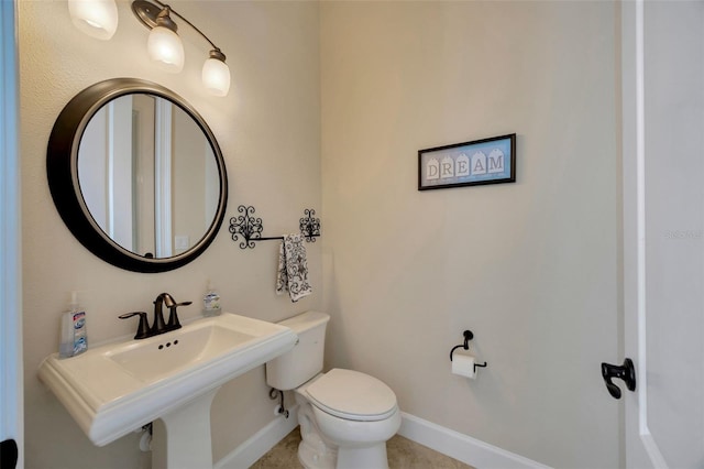 4411 Culbreath Rd, Valrico, FL 33596 - half bath with toilet, baseboards, and a sink