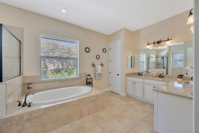 4411 Culbreath Rd, Valrico, FL 33596 - bathroom featuring a bath, a shower stall, tile patterned floors, and vanity