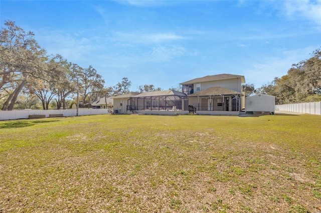 4411 Culbreath Rd, Valrico, FL 33596 - view of yard featuring a lanai and a fenced backyard