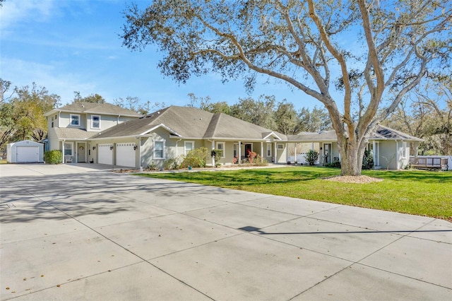4411 Culbreath Rd, Valrico, FL 33596 - view of front facade with a residential view, driveway, an attached garage, and a front lawn