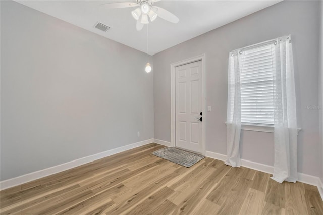 4411 Culbreath Rd, Valrico, FL 33596 - foyer featuring a ceiling fan, visible vents, baseboards, and light wood finished floors