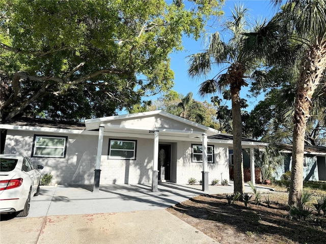 view of front of house featuring brick siding