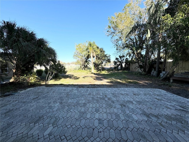 view of yard with fence