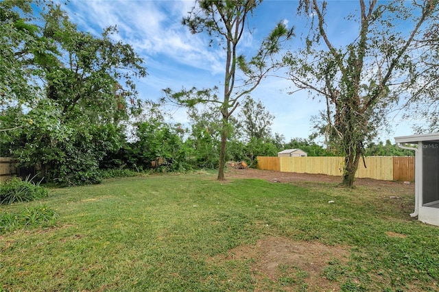 view of yard with fence