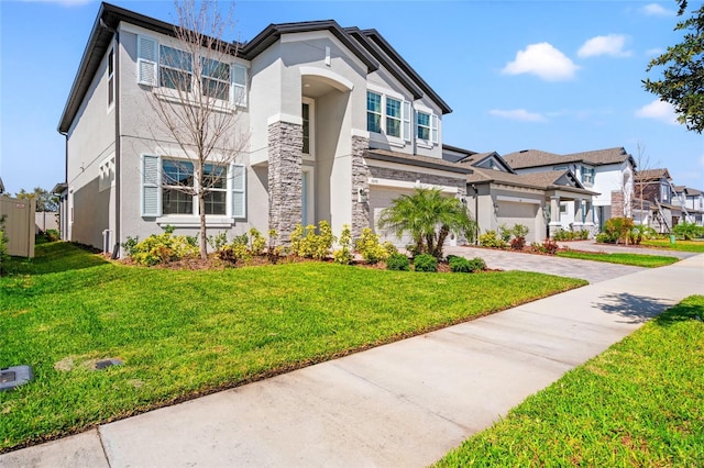 view of front of property featuring stone siding, a front yard, decorative driveway, and stucco siding