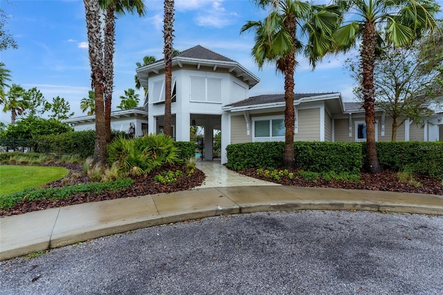 view of front of property with a carport