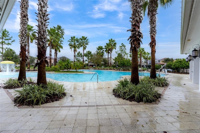 community pool featuring a patio