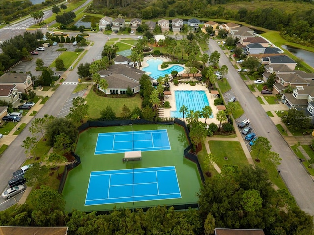 birds eye view of property with a residential view