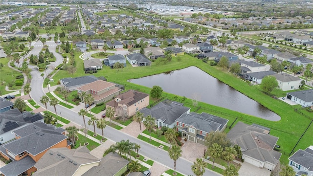 aerial view featuring a water view and a residential view