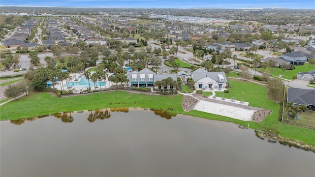 aerial view featuring a residential view and a water view