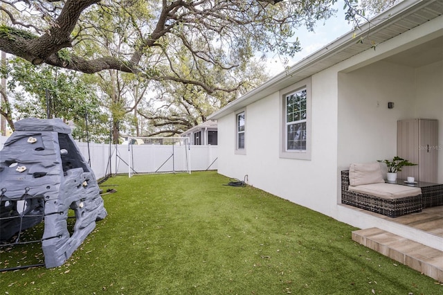 view of yard with a fenced backyard