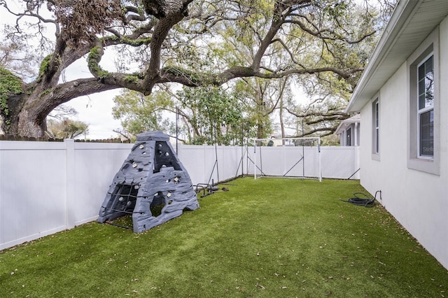 view of yard featuring a fenced backyard