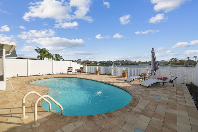 view of swimming pool with a patio area and a fenced backyard