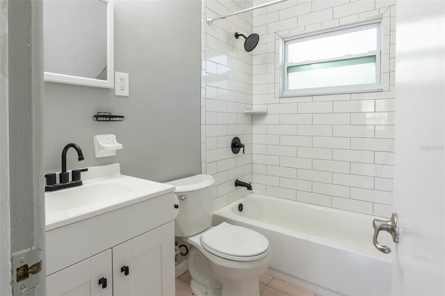 bathroom with washtub / shower combination, tile patterned flooring, vanity, and toilet